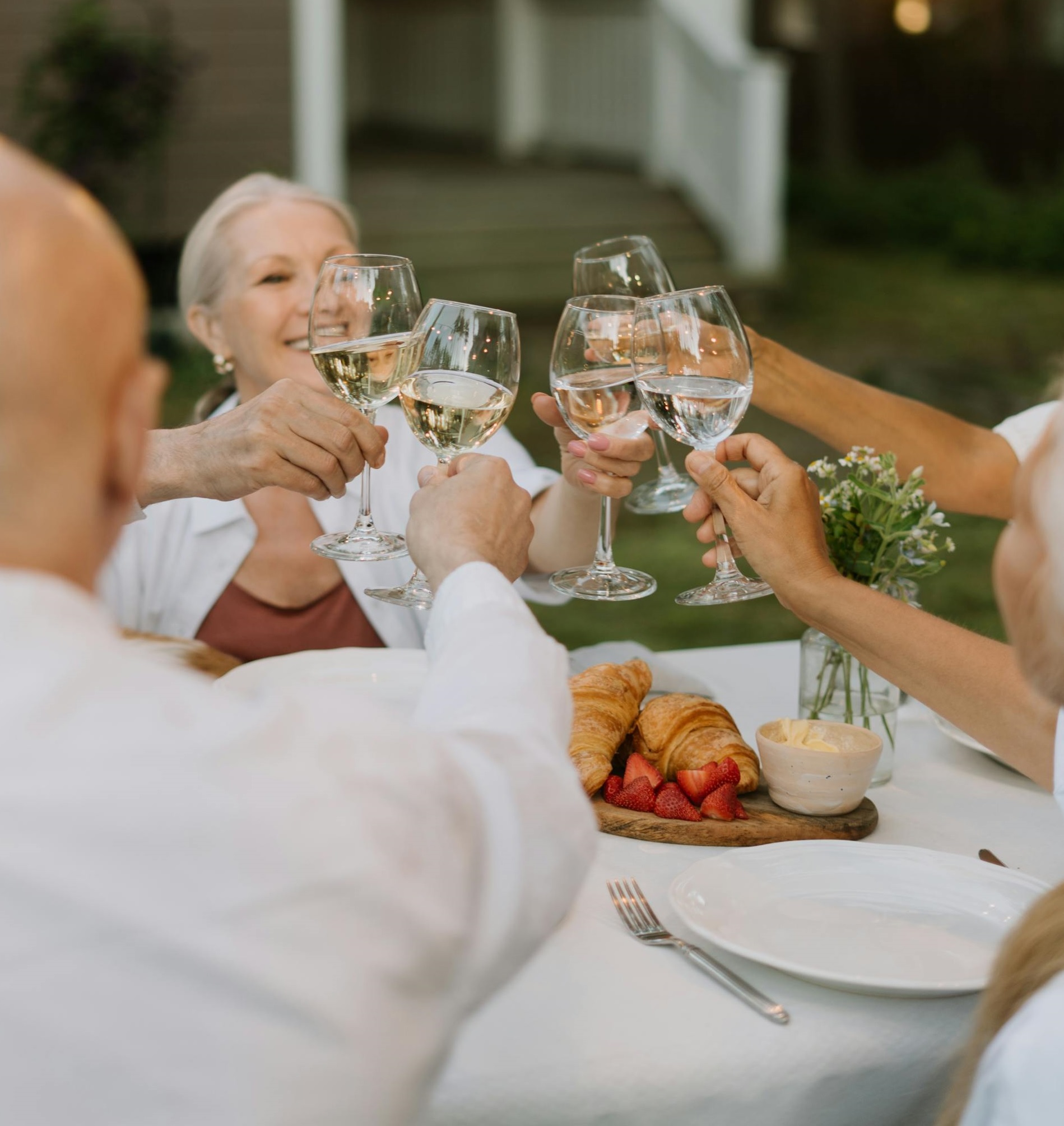 Take the initiative to host social gatherings or dinner parties in your home. Invite neighbors, coworkers, or acquaintances you've met through other activities, providing a relaxed and welcoming setting for fostering connections and building friendships. :: Pexels