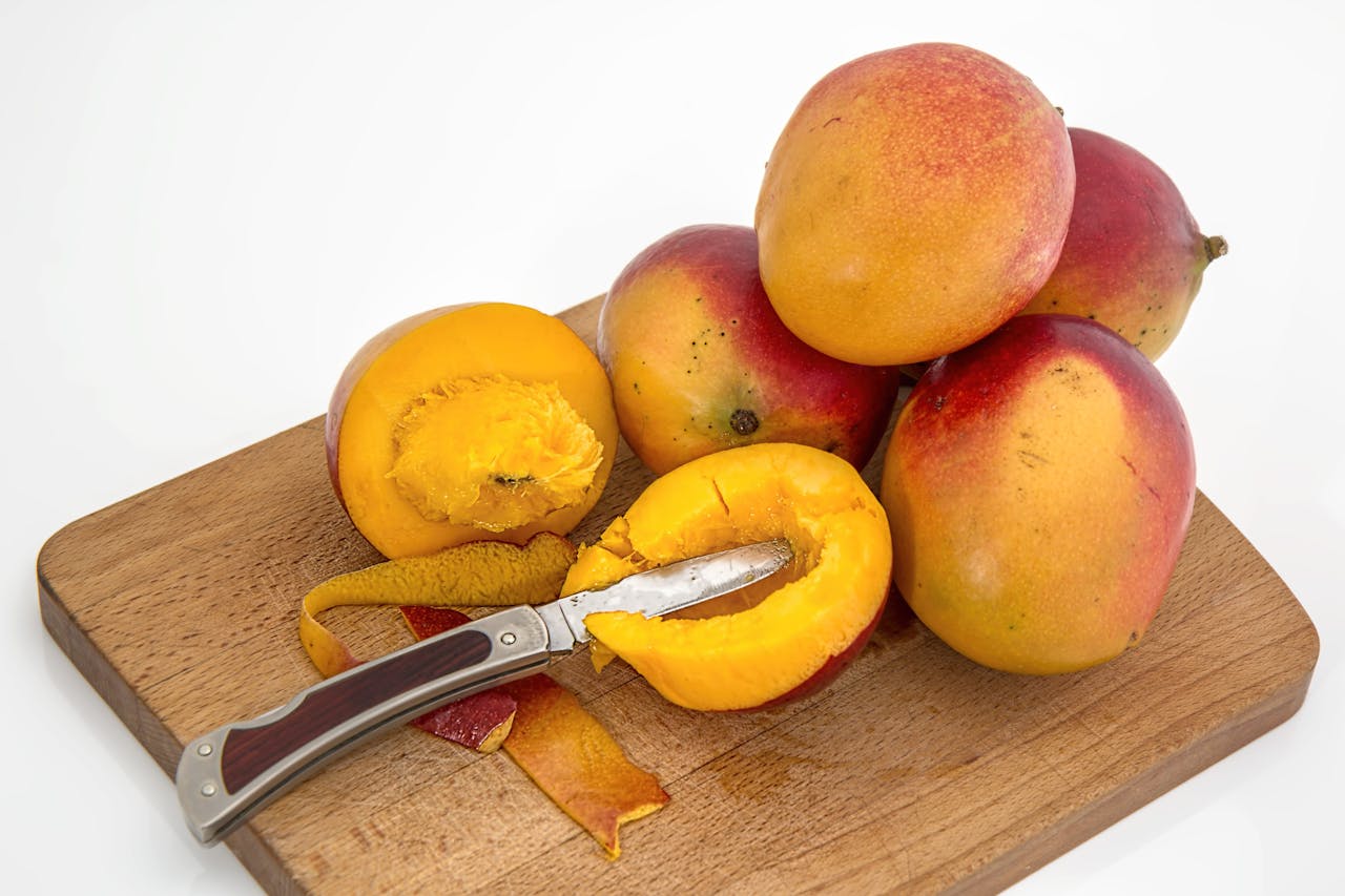 Mangoes are not just a summertime delight; they're also a great source of vitamin C. One cup of sliced mango provides about 60 mg of vitamin C. Mangoes are also rich in vitamin A, which is essential for eye health. Their high antioxidant content helps fight free radicals and supports overall skin health. :: Pexels