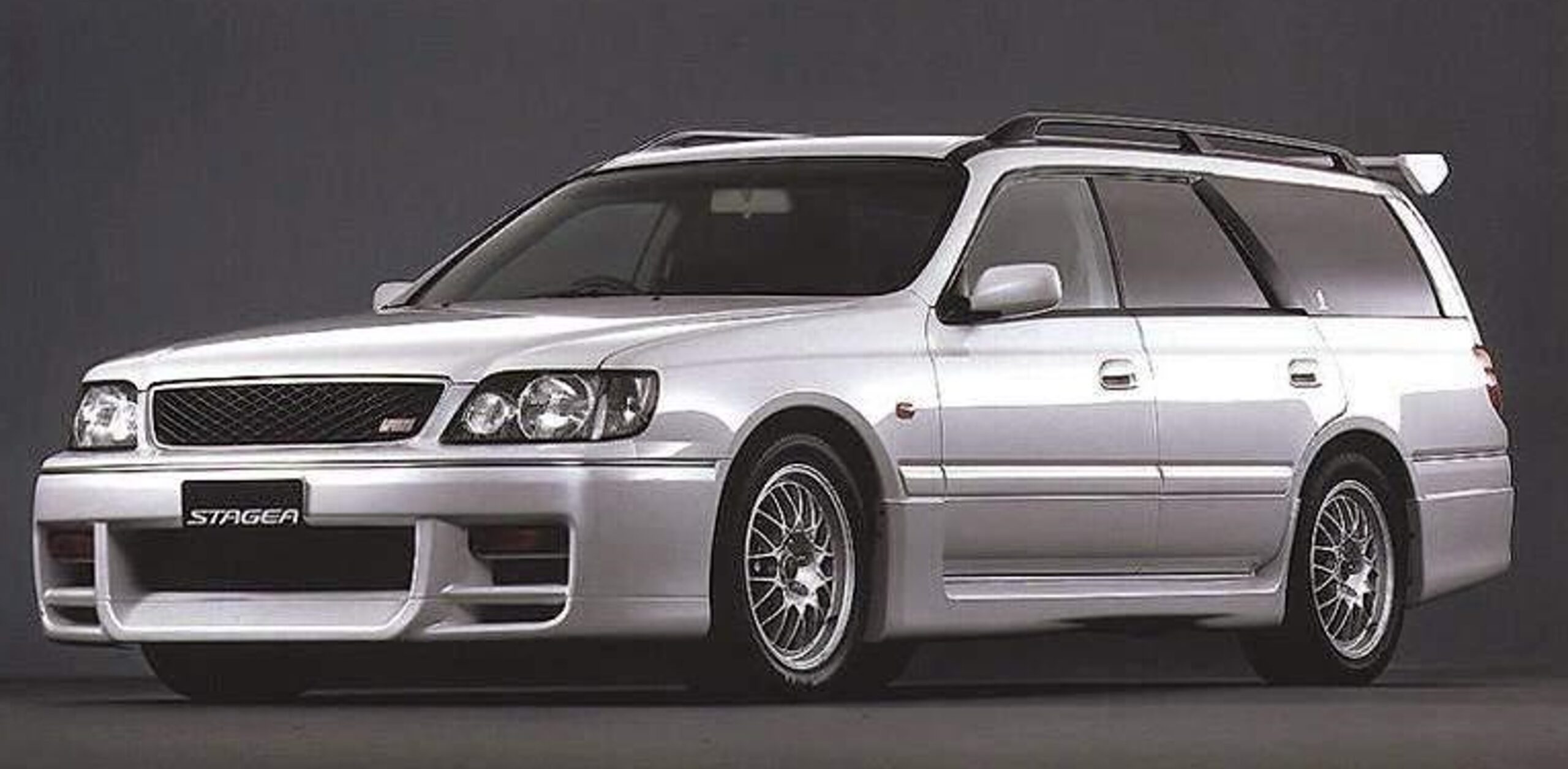 <p>The Nissan Stagea is a mid-size station wagon produced from 1996 to 2007, often dubbed the "Skyline Wagon" due to its shared platform with the Nissan Skyline. The most sought-after models are those equipped with the RB26DETT engine from the Skyline GT-R, offering incredible performance in a practical wagon body. It's a versatile and powerful choice for enthusiasts needing space and speed. The RB26DETT engine is legendary for its tuning potential, capable of achieving extreme power outputs with the right modifications. The Stagea’s chassis also supports extensive performance upgrades, making it an ideal choice for those who want a high-performance vehicle with ample cargo space. </p>:: Nissan