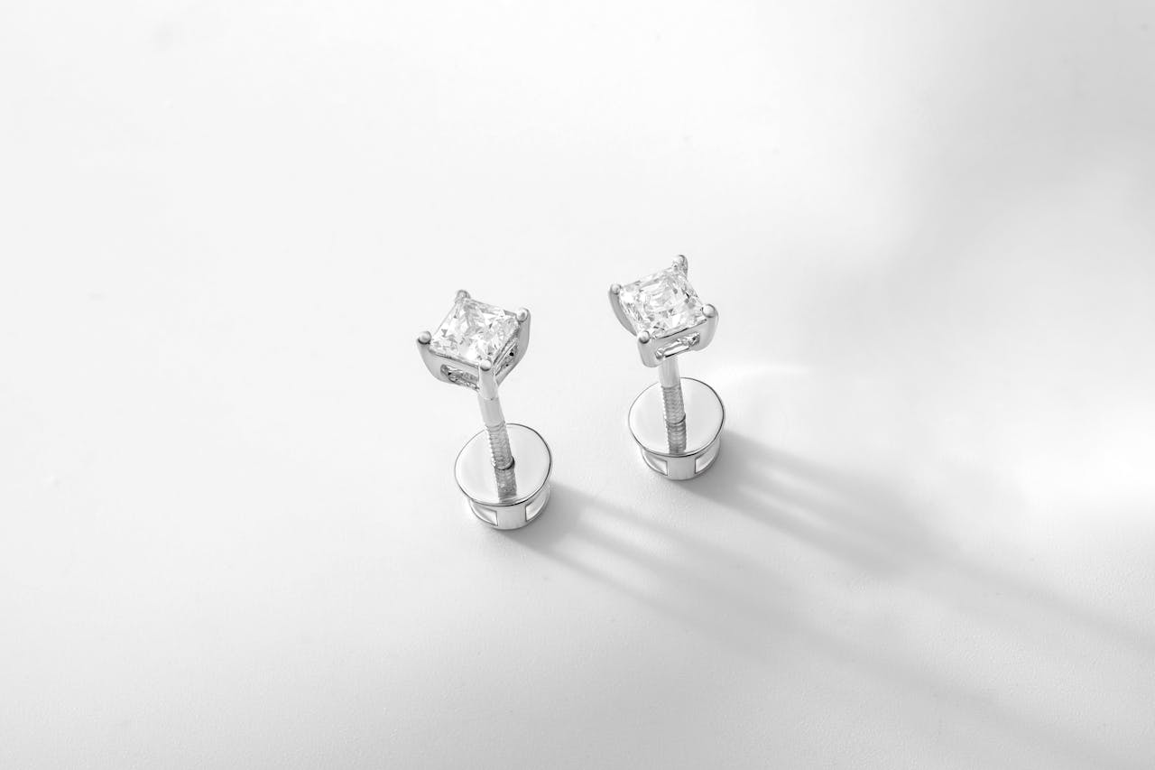 <p> If there’s one piece of jewelry every woman should own, it's a pair of diamond stud earrings. Simple, understated, and effortlessly chic, diamond studs are the epitome of timeless elegance. These sparkling gems can be worn with everything from an evening gown to your favorite sweater and jeans. While diamonds are traditionally associated with special occasions, their versatility makes them perfect for everyday wear. A well-cut, high-quality pair of diamond studs will never go out of style and can even be passed down as a family heirloom. Pro Tip: If you're on a budget, you can opt for cubic zirconia or moissanite stones that offer the same sparkle for a fraction of the cost. </p> :: Pexels