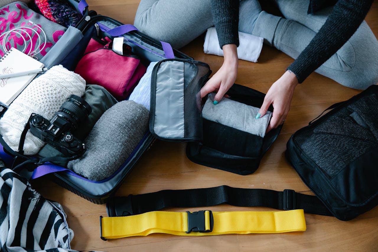 <p> Packing cubes are a traveler's best friend when it comes to maintaining organization. These small, zippered compartments help categorize your belongings, making it easier to find what you need without rummaging through your entire suitcase. Designate a packing cube for each category of items, such as clothing, toiletries, and electronics. This method not only keeps your suitcase tidy but also allows for quick and efficient packing and unpacking at your destination. Packing cubes come in various sizes and can be compressed to save space. Some even have mesh panels for breathability and visibility, so you can easily identify the contents. </p> :: Pexels