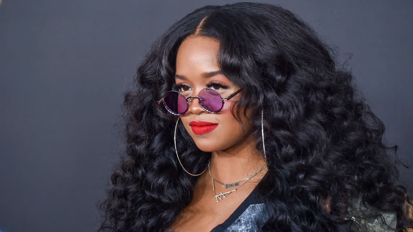 <p> While H.E.R. has gained recognition in recent years, she still deserves a mention as an underrated artist in the RnB genre. With her soulful voice, exceptional guitar skills, and introspective lyrics, H.E.R. has carved out a unique space for herself in the music industry. Her self-titled debut album features hits like “Focus” and “Best Part,” showcasing her ability to blend RnB with elements of soul and pop. H.E.R.’s music often explores themes of love, heartbreak, and empowerment, making her relatable to a broad audience. Her raw talent and dedication to her craft solidify her place among the top artists to add to your playlist. </p> :: Getty Images