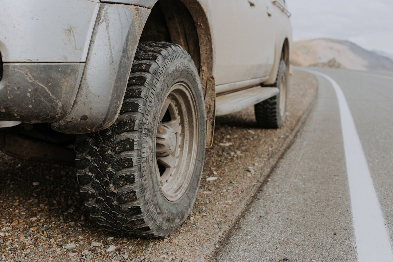 <p> Harsh driving conditions, such as rough roads, potholes, and excessive speeding, can put unnecessary strain on your tires, accelerating the aging process. When driving over rough terrain or in extreme weather conditions, take extra care to avoid damaging your tires. The less wear and tear your tires endure, the less likely they are to develop dry rot prematurely. Maintaining safe driving habits can go a long way in preserving your tires’ health and preventing early signs of dry rot. </p> :: Pexels