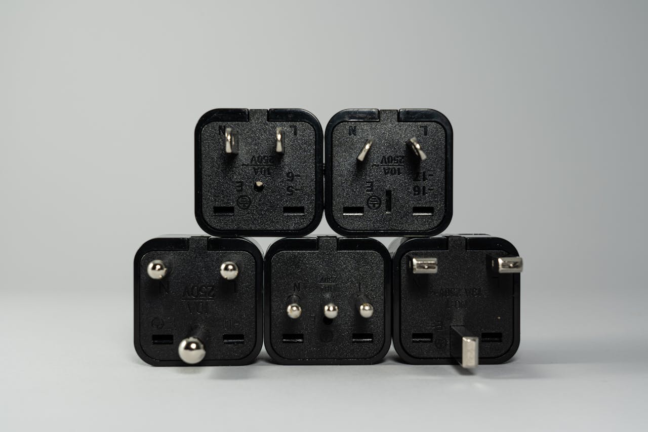 <p> If your road trip includes visits to different countries, a universal travel adapter can come in handy. It allows you to charge your devices regardless of the type of outlet you encounter. Many adapters also come with USB ports, adding extra functionality. This accessory is invaluable for international road trips, ensuring you can stay connected no matter where you are. Choose an adapter with surge protection to safeguard your devices from power fluctuations, providing peace of mind during your travels. </p> :: Pexels