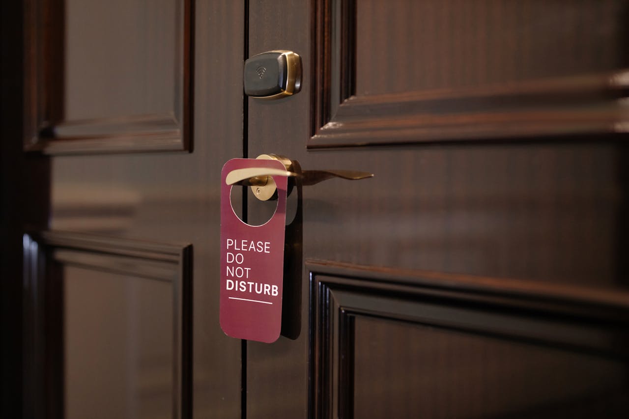 <p> The "Do Not Disturb" sign isn’t just a suggestion; it’s a way to communicate with hotel staff that you want privacy. Ignoring this sign can result in awkward moments or unwanted interruptions. Whether you're resting, working, or just need some time alone, make sure you use the sign correctly. At the same time, don't forget to take it down when you're ready for housekeeping or other services. If you continuously leave the sign up and still expect staff to provide services, it can create confusion. Being clear about your needs by using or removing the sign ensures that both you and the hotel staff are on the same page. </p> :: Pexels