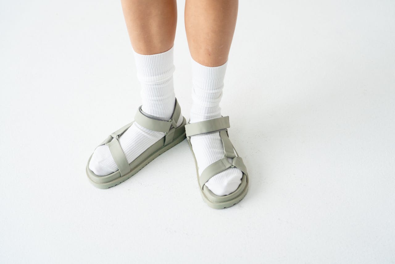 <p> Socks with sandals were once a universally recognized fashion faux pas, but they’ve recently evolved into a trend embraced by fashion-forward individuals. Celebrities and influencers alike have been spotted sporting the once-derided combo, elevating it from its previously "uncool" status. Supporters love the casual comfort and retro vibes the pairing offers, seeing it as a quirky, unexpected way to accessorize. Detractors, however, still view the look as a fashion blunder, arguing that it contradicts the purpose of sandals and looks unrefined. Despite the divided opinions, socks and sandals remain a trend that refuses to die. </p> :: Pexels