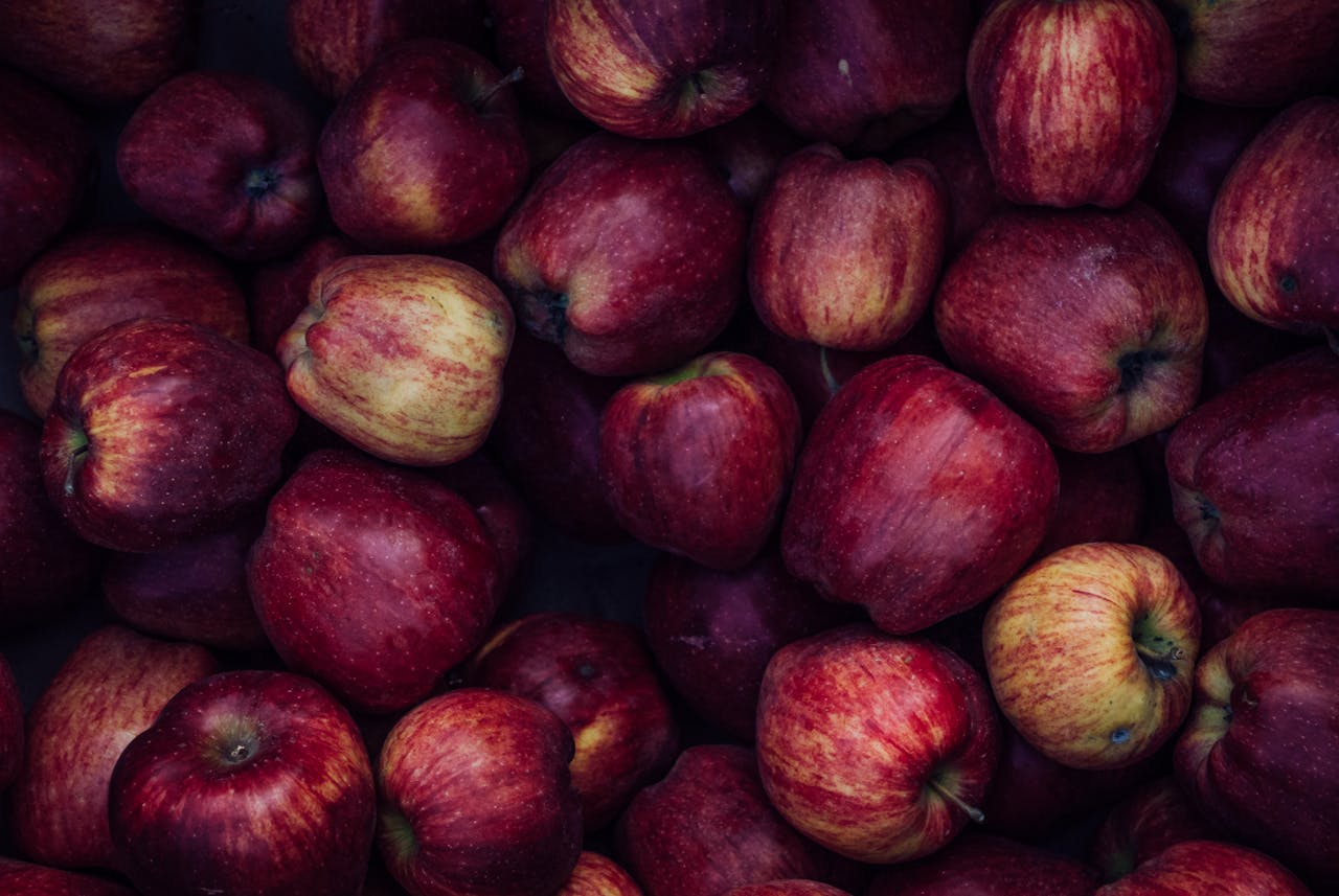 <p> Crisp, juicy apples are a hallmark of fall, offering a refreshing sweetness that brightens up any dish. From sweet varieties like Fuji and Honeycrisp to tart options like Granny Smith, there’s an apple for every palate. Apples shine in both sweet and savory applications, making them incredibly versatile. Use them in pies, crumbles, or sauces, or add slices to salads and cheese boards for a crunchy contrast. They also work beautifully in savory dishes, such as roasted pork or apple-stuffed squash. Celebrate apple season by experimenting with this fruit and bringing its delightful flavors to your kitchen. </p> :: Pexels