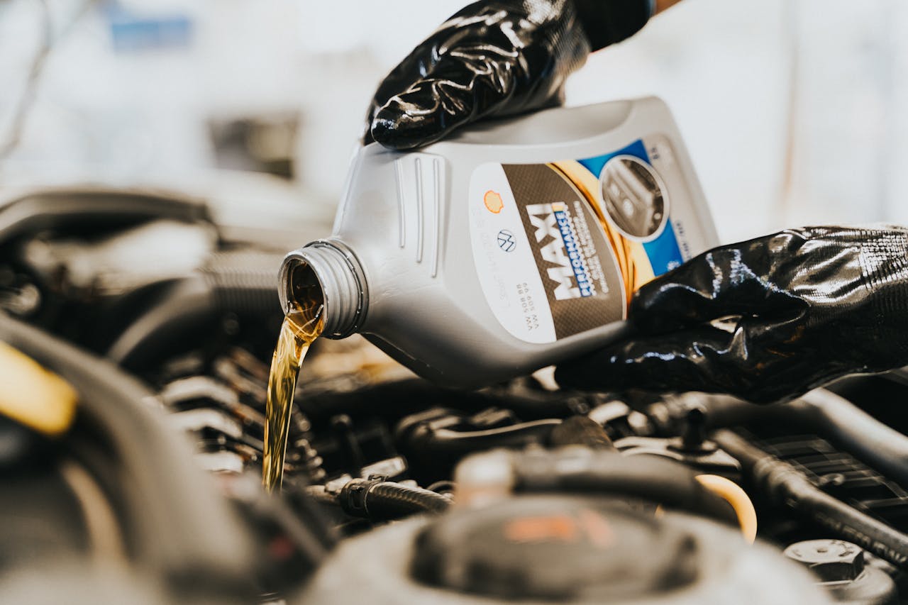 <p> Changing your car’s oil is one of the most routine and essential maintenance tasks that can be done at home. Regular oil changes ensure that your engine runs smoothly, extends its life, and prevents expensive breakdowns. To do this yourself, you’ll need a few basic items: the correct type of oil, a new oil filter, a wrench, and a drain pan. Start by loosening the drain plug to empty the old oil, then replace the oil filter, and finish by refilling the engine with new oil. This task, which can be done in under an hour, will save you around $40 to $70 per oil change, depending on your car’s make and model. By doing this at home, you avoid labor charges and only pay for the oil and filter, making it a great way to keep maintenance costs down. </p> :: Pexels