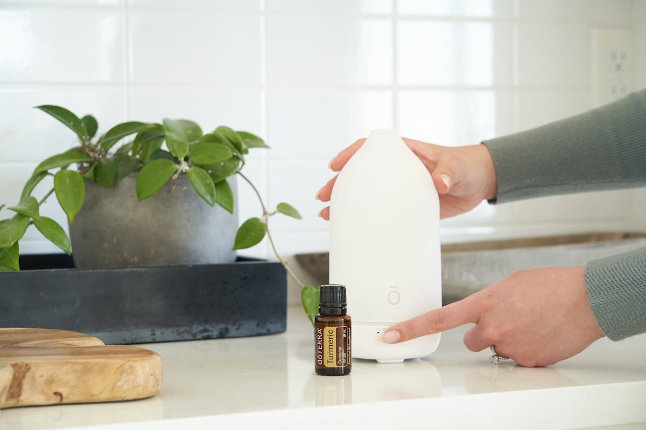 <p> Essential oil diffusers are an easy way to introduce natural, long-lasting scents into your home. These devices release a fine mist of water infused with your favorite essential oils, creating a calming and fresh atmosphere. Popular essential oils like lavender, eucalyptus, peppermint, and citrus can enhance different areas of your home while providing additional aromatherapy benefits such as stress relief and mood enhancement. The best part? Diffusers come in a variety of designs and sizes, making it easy to find one that complements your home’s style while keeping it smelling fantastic. </p> :: Pexels