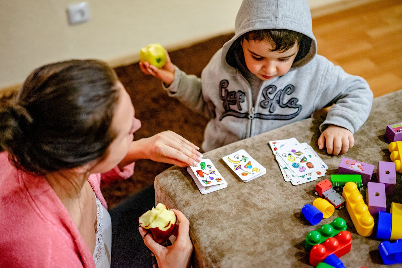 <p> Spot It! is an engaging and visually stimulating card game that challenges players to find matching symbols between cards. The game consists of circular cards, each featuring various symbols, and players must quickly identify the one symbol that matches between any two cards. With multiple mini-games to choose from, Spot It! allows families to customize the experience to suit their preferences. The game is perfect for developing observation skills and quick reflexes, making it a hit among kids and adults alike. The fast-paced nature of Spot It! ensures everyone remains engaged, making it a lively addition to any family game night. </p> :: Pexels