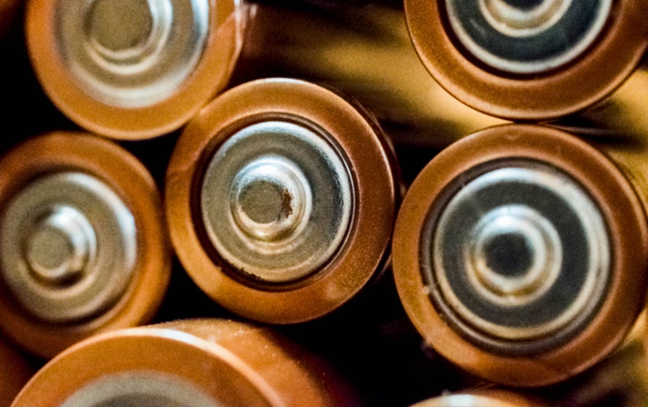 <p> Batteries, especially non-rechargeable types like alkaline batteries, should not be left in your car. Extreme temperatures can cause batteries to leak or even explode, which can damage your vehicle’s interior and create a hazardous mess. Additionally, batteries can lose their charge more quickly when exposed to heat or cold. To ensure batteries last longer and don’t pose a safety risk, store them in a temperature-controlled environment. </p> :: Pexels