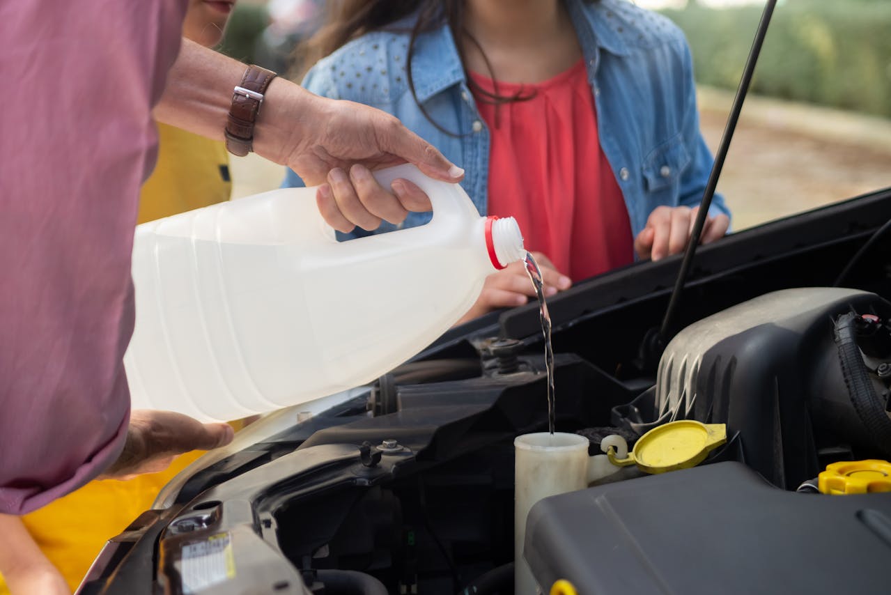 <p> Your vehicle relies on various fluids—engine oil, coolant, transmission fluid, and brake fluid—to function correctly. Failing to check and maintain proper fluid levels can lead to overheating, transmission failure, or brake problems. Regularly checking and topping off fluids as needed can prevent significant mechanical issues and preserve the value of your car by ensuring it runs efficiently. </p> :: Pexels