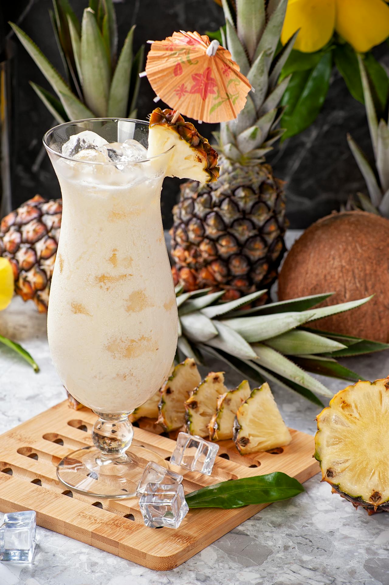 <p> Transport yourself to a tropical paradise with the Pineapple Coconut Mocktail. This drink combines the sweet and creamy flavors of pineapple and coconut, making it a perfect choice for summer parties or beach-themed events. It's creamy, sweet, and utterly refreshing, making it a hit at any gathering. </p> :: Pexels