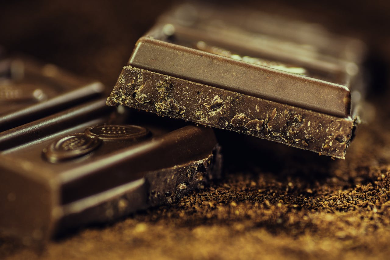 <p> Dark chocolate, when eaten in moderation, can actually help lower blood pressure. It contains flavonoids, which promote the production of nitric oxide in the body. Nitric oxide relaxes and dilates blood vessels, improving circulation and reducing blood pressure. Research suggests that consuming small amounts of dark chocolate, with at least 70 percent cocoa, can lead to improvements in blood pressure levels. Enjoy a square or two of dark chocolate as a treat while also benefiting your heart. </p> :: Pexels