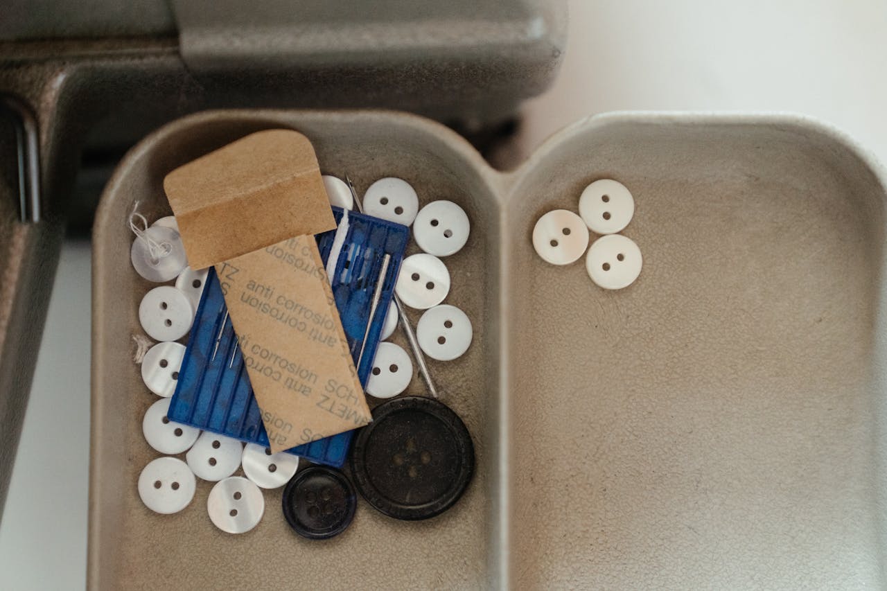 <p> Sewing kits are a handy item often found in hotel room drawers or bathroom cabinets. These small kits include essentials like needles, thread, and buttons, designed to help guests with quick wardrobe fixes. Hotels provide these kits for single-use purposes, and they are not meant to be reused. Even if you don’t need a sewing kit during your stay, it can be a lifesaver in case of an emergency. These compact kits are perfect for keeping in your travel bag or purse, making them a useful item to take home without any guilt. </p> :: Pexels