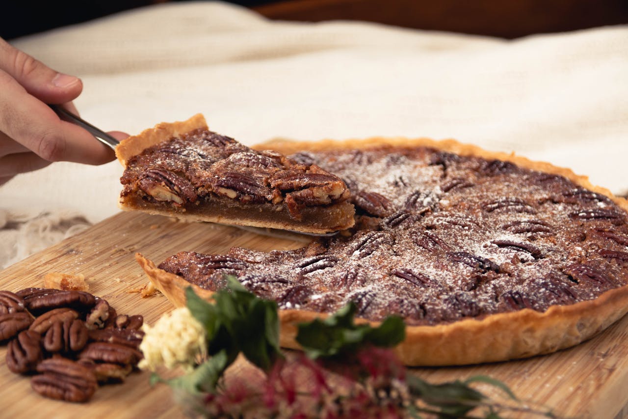 <p> Why settle for pie slices when you can serve up pecan pie bars? These handheld treats feature a buttery shortbread crust topped with a gooey pecan filling. Easy to grab and even easier to devour, they are the perfect addition to your dessert spread. </p> :: Pexels