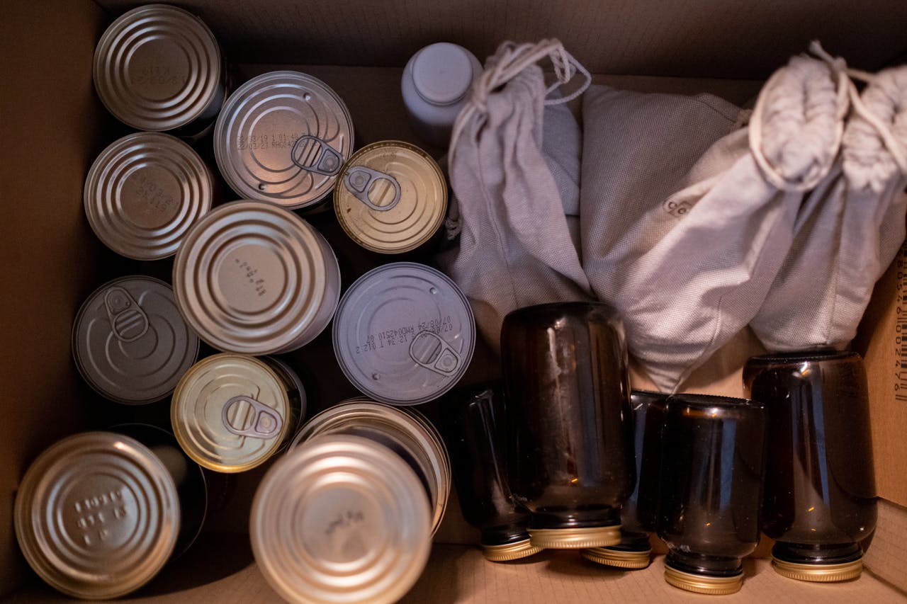 <p> While canned foods are great for stockpiling emergency supplies, they don’t fare well in freezing temperatures. The liquid inside the can can expand as it freezes, causing the can to bulge or even burst open. Even if the can doesn’t break, freezing can alter the texture and taste of the food inside. This can lead to an unpleasant eating experience or, worse, food that’s no longer safe to consume. To avoid dealing with these problems, keep canned goods inside your home or in a temperature-stable location, especially during the colder months. </p> :: Pexels