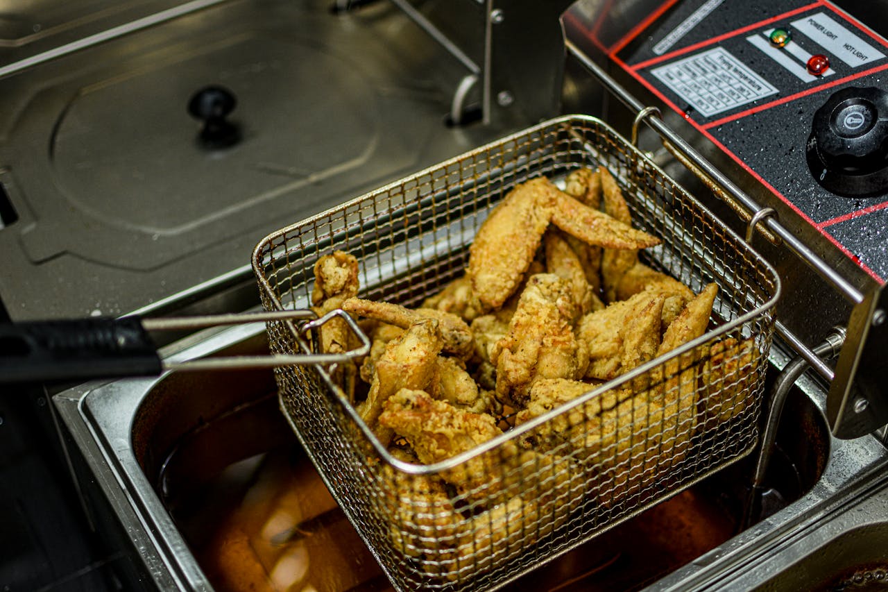 <p> Fried foods, including French fries, fried chicken, and deep-fried snacks, may taste delicious, but they’re loaded with unhealthy fats, particularly trans fats. These fats are known to raise bad cholesterol (LDL) levels and lower good cholesterol (HDL), leading to plaque buildup in the arteries. This process can increase your risk of atherosclerosis, which significantly raises the risk of heart disease. Cardiologists advise steering clear of fried foods altogether and choosing healthier cooking methods like grilling, steaming, or baking to protect your heart. </p> :: Pexels