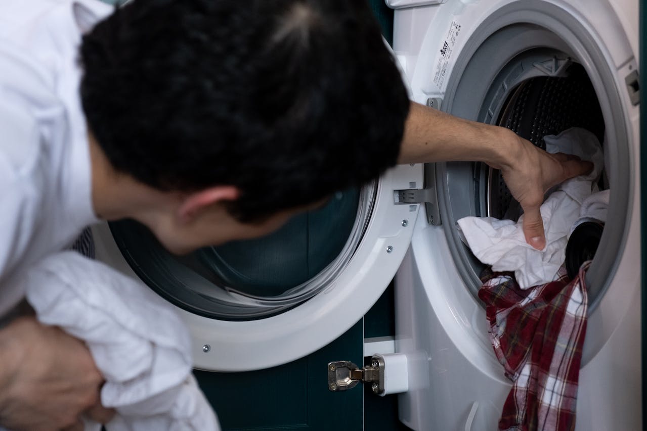 <p> Overloading your washing machine might seem like a great way to save time and reduce the number of loads, but it’s actually causing more harm than good. Excess weight puts stress on the motor, drum, and suspension, leading to faster wear and tear and potential breakdowns. Overloaded machines also fail to clean clothes effectively because the detergent and water can’t circulate properly. This means you’ll likely need to rewash clothes, using even more water and electricity. To maximize efficiency, stick to the manufacturer’s recommended load size and balance heavy items evenly in the drum. Additionally, running smaller loads when needed can improve the longevity of your machine and ensure cleaner clothes with less strain on the appliance. </p> :: Pexels