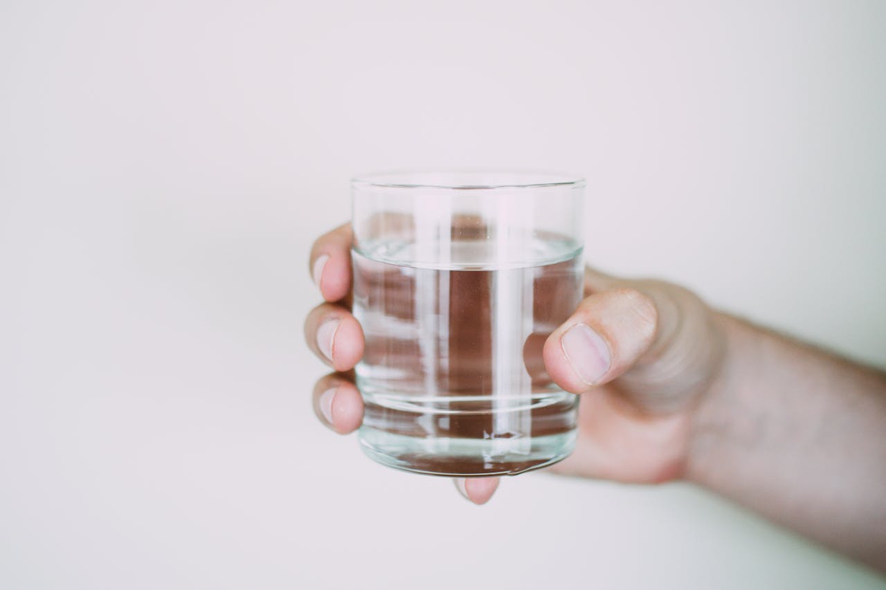 <p> The recommendation to drink eight glasses of water a day is more of a guideline than a strict rule. Your hydration needs depend on factors such as activity level, diet, and the climate you live in. Foods with high water content, such as cucumbers, oranges, and watermelons, contribute to your hydration and can help reduce the amount of liquid you need to drink. Additionally, beverages like herbal teas and milk count toward your daily fluid intake. Rather than fixating on a number, listen to your body and drink whenever you feel thirsty. </p> :: Pexels