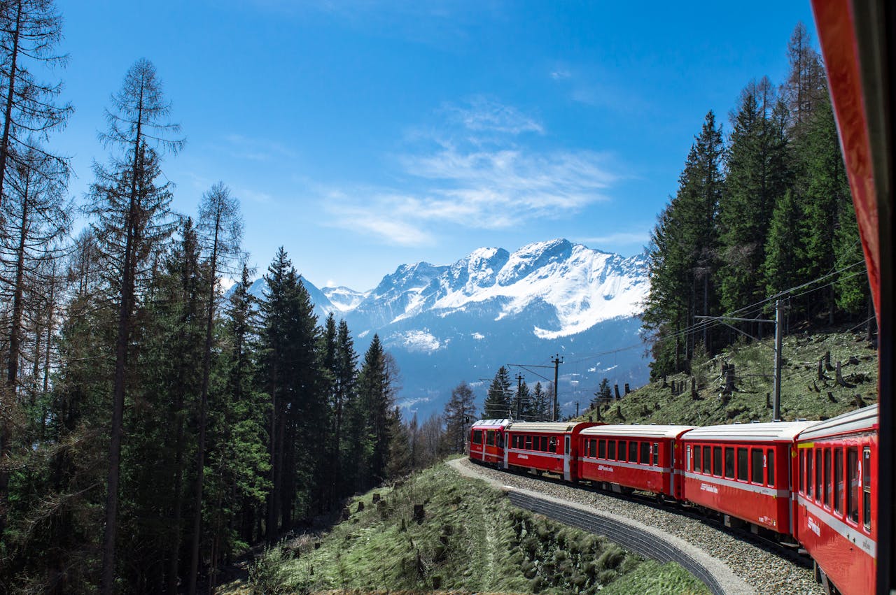 <p> The Bernina Express is a cross-border journey that seamlessly combines the best of Switzerland and Italy. This UNESCO-listed route begins in Chur and winds its way to Tirano, offering views of glaciers, sparkling lakes, and charming alpine villages. Highlights include the spectacular Landwasser Viaduct and the spiraling Brusio Circular Viaduct. This four-hour trip is a feast for the senses, blending the natural beauty of the Alps with the architectural marvels of the railway. </p> :: Pexels