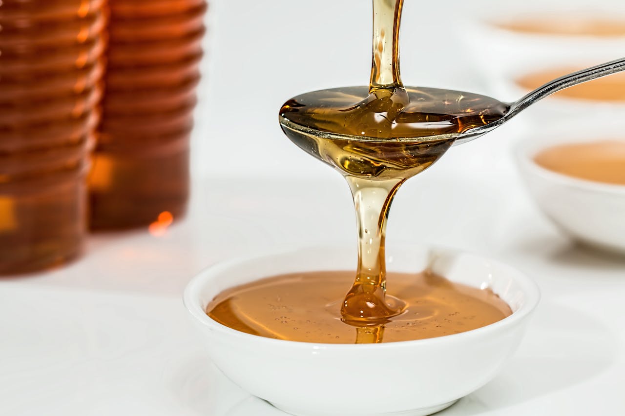 <p> Honey, maple syrup, and agave are often marketed as healthier alternatives to refined sugar, but they are still forms of sugar. While they might contain small amounts of minerals or antioxidants, these benefits are negligible unless consumed in very large quantities—which isn’t advisable. Overindulging in natural sweeteners can still contribute to weight gain, blood sugar spikes, and dental issues. The takeaway? Treat natural sweeteners just like any other sugar and consume them sparingly as part of a balanced diet. </p> :: Pexels