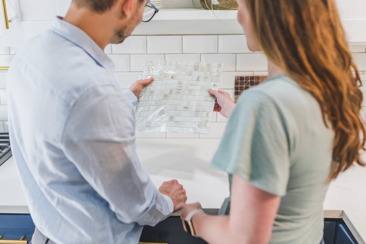 <p> Installing a backsplash in your kitchen is a project that can dramatically enhance the look of the space. While it might seem like a job for a tile expert, many homeowners find that they can install their own backsplash with minimal experience. Whether you’re working with subway tiles, peel-and-stick tiles, or even glass tiles, there are plenty of resources to guide you through the installation process. Not only will you save on labor costs, but you’ll also get to enjoy the satisfaction of completing a project that adds both beauty and value to your home. </p> :: Pexels