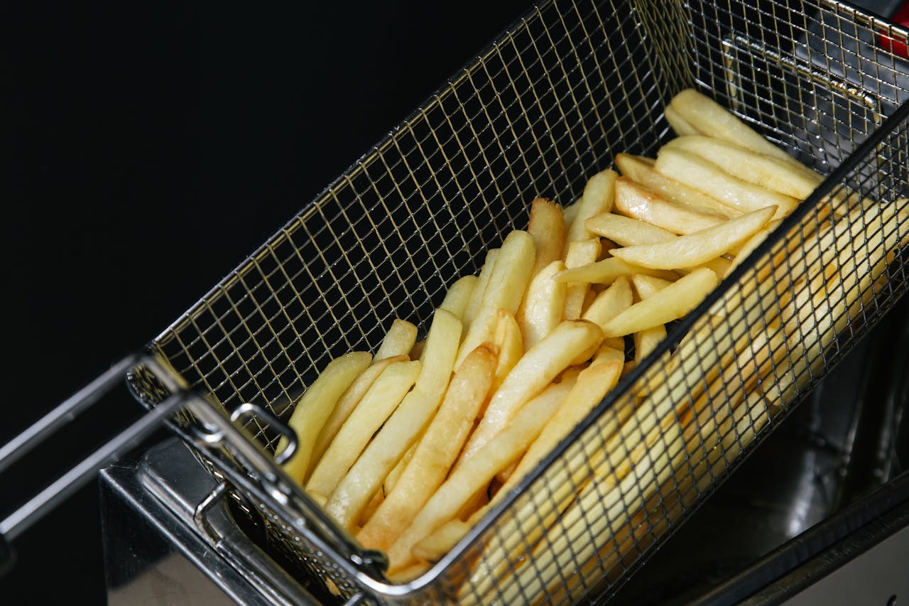 <p> Few things are as tempting as crispy fries or fried chicken, but fried foods are among the worst offenders when it comes to heart health. They are often cooked in unhealthy oils high in trans fats and saturated fats, which clog arteries and raise levels of bad LDL cholesterol. Additionally, frying produces compounds called advanced glycation end products (AGEs), which can increase inflammation and oxidative stress in the body. Both inflammation and oxidative stress are key contributors to cardiovascular disease. If you enjoy fried foods, consider air-fried or oven-baked alternatives to reduce your risk. </p> :: Pexels