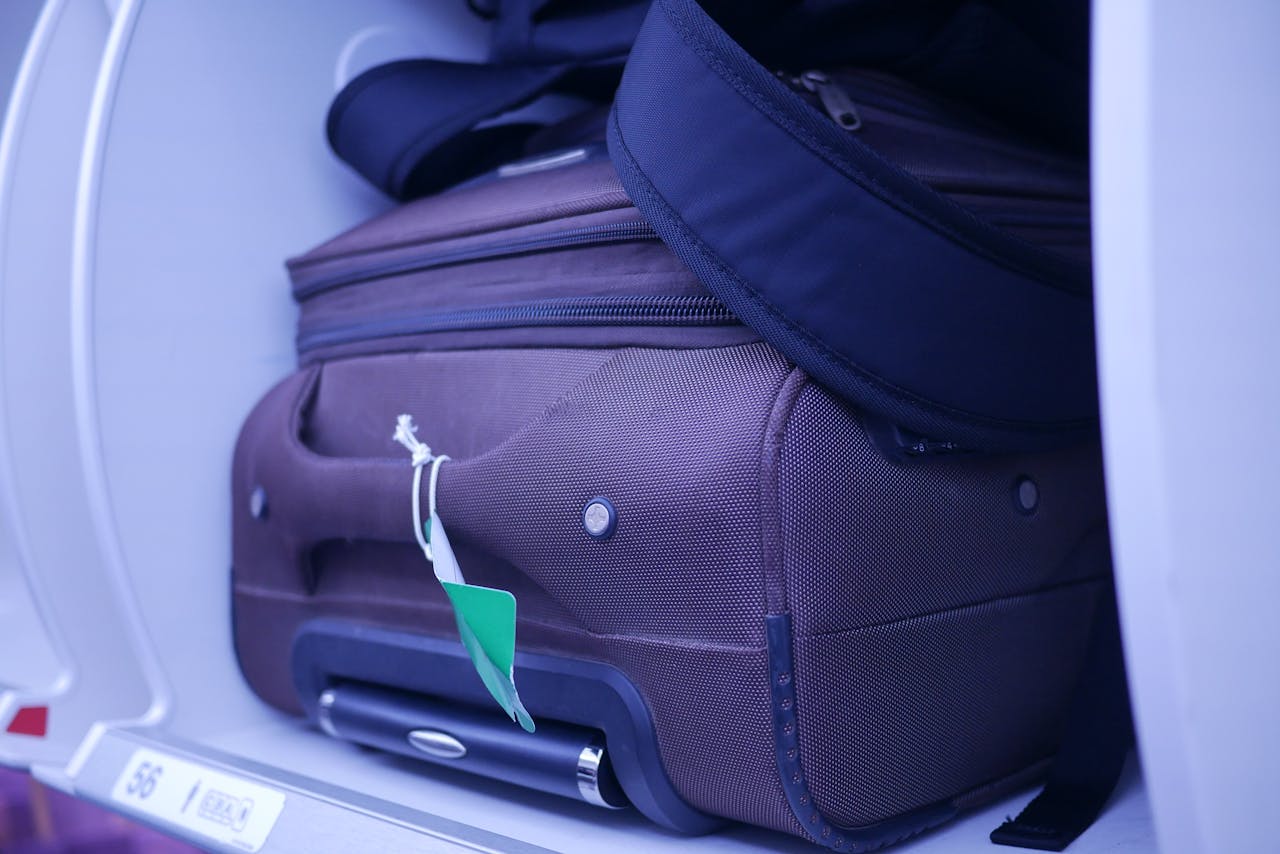 <p> It’s easy to overpack your carry-on bag with everything you think you might need, but this often leads to frustration. A heavy or overstuffed bag can be hard to store in the overhead compartment or under the seat. Plus, it can be difficult to find what you need when your bag is crammed full. To avoid this, pack only the essentials: snacks, a water bottle, entertainment (like a book or tablet), personal hygiene items, and a neck pillow. Keeping your carry-on bag light and organized will make your flight more enjoyable and less stressful. Overpacking can also lead to unnecessary stress when you have to navigate through the airport. A smaller, more organized carry-on bag will allow you to move quickly through security and customs. Be sure to check your airline’s baggage policy to avoid any surprises at the gate. Many airlines have strict weight and size limits for carry-ons, and exceeding these limits can result in additional fees. </p> :: Pexels