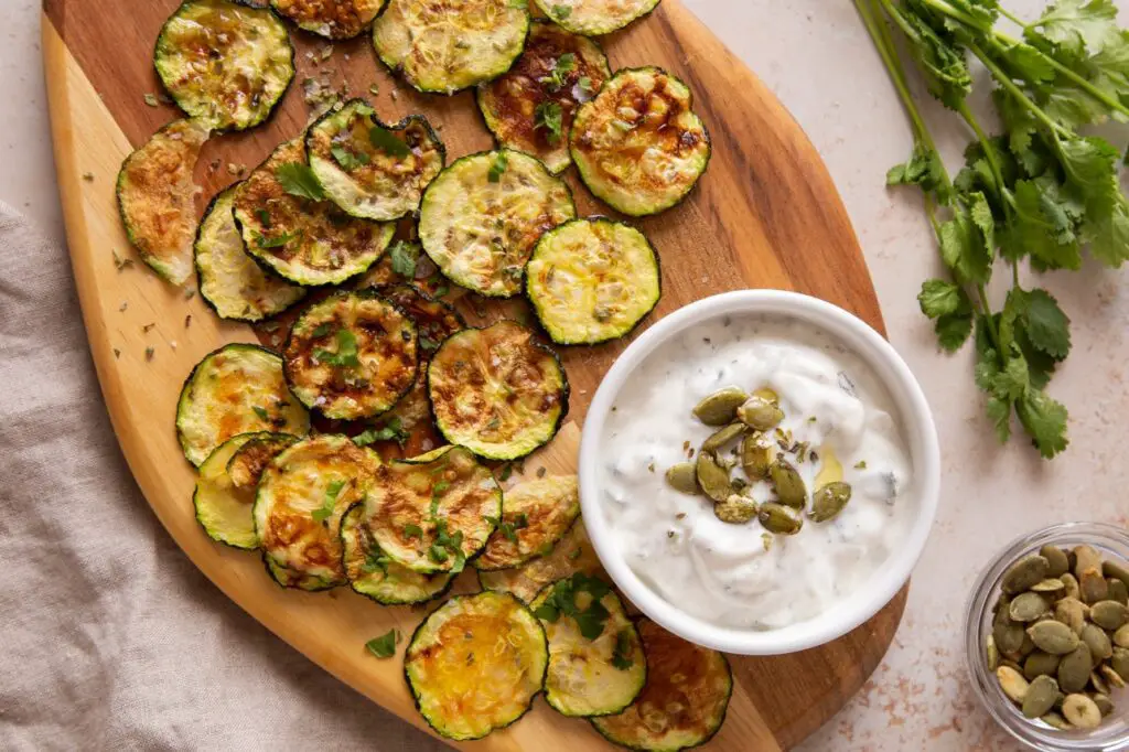 <p> If you’re craving something crunchy, zucchini chips are an excellent alternative to traditional potato chips. Slice a zucchini into thin rounds, drizzle with olive oil, and season with salt, pepper, and your favorite spices. Then, bake them in the oven at 375°F for about 15-20 minutes, flipping halfway through, until they’re crispy. These chips are low in carbs and high in fiber, making them a perfect keto-friendly snack. They’re also easy to make in batches and store for later, so you can have a crunchy snack ready when you need it. Zucchini chips are a great way to get in some extra veggies while keeping your carb count low. </p> :: Freepik