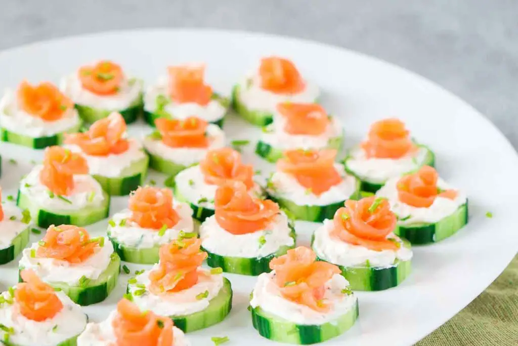 <p> For a refreshing and light snack, cucumber slices with cream cheese and smoked salmon are a great choice. Simply slice a cucumber, spread a little cream cheese on each slice, and top with a piece of smoked salmon. This snack is packed with healthy fats from the cream cheese and salmon, and the cucumber adds a refreshing crunch. It’s quick to make and doesn’t require much prep work, making it perfect for busy professionals. The combination of cream cheese and smoked salmon also gives you a good dose of omega-3 fatty acids, which are great for heart health. </p> :: deliciousmeetshealthy.com