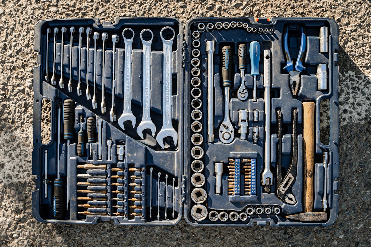 <p> Having a basic set of wrenches and sockets in your car can come in handy for a variety of tasks, from tightening loose bolts to making adjustments under the hood. A good set should include both standard and metric sizes to ensure you’re prepared for any situation. If you’re comfortable with basic car maintenance, this tool set can help you perform minor repairs on the go, such as replacing a loose exhaust or fixing a broken bracket. A wrench and socket set doesn’t take up much space and can be stored in your trunk or under the seat, making it an essential tool for anyone who wants to be prepared for unexpected issues. </p> :: Pexels