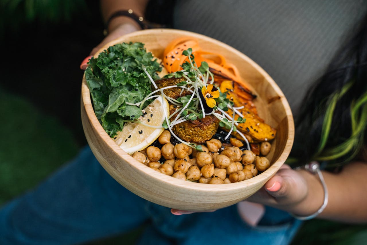 <p> This vibrant and wholesome bowl is loaded with roasted vegetables and seasoned chickpeas, making it a fiber-rich, plant-based meal. Roast sweet potatoes, Brussels sprouts, carrots, and red onions until caramelized, and toss them with chickpeas seasoned with paprika, cumin, and garlic powder. Drizzle the bowl with tahini sauce or a lemon-tahini dressing for a creamy finish. This dish is perfect for boosting energy levels and supporting gut health while offering a burst of flavor in every bite. Add avocado slices or a soft-boiled egg for extra richness. </p> :: Pexels