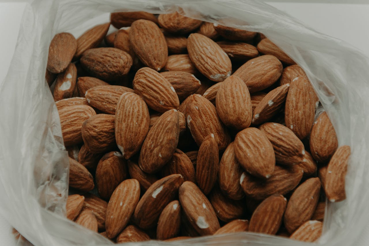 <p> Almonds are a fantastic snack for preventing muscle cramps, thanks to their high magnesium content. Magnesium helps relax muscles and supports proper nerve function, reducing the risk of spasms. Almonds are also rich in vitamin E, which aids in muscle recovery and protects cells from oxidative stress. A handful of almonds can provide a quick energy boost and essential nutrients, making them a perfect on-the-go snack. </p> :: Pexels