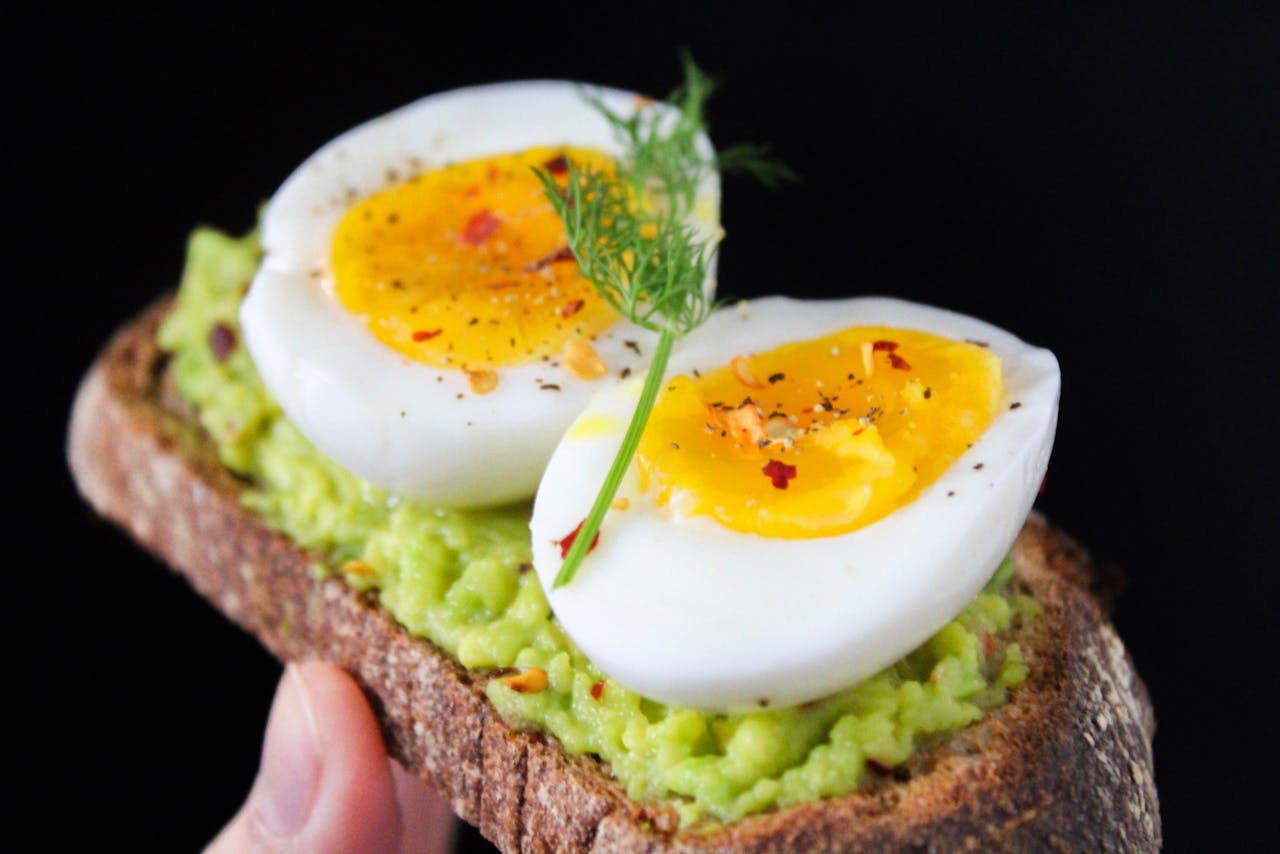 <p> Start your day with a nutrient-packed breakfast that’s as simple as it is delicious. Spread ripe avocado on a slice of whole-grain toast and top it with a perfectly poached egg. Sprinkle with a pinch of sea salt, black pepper, and a few chili flakes for a touch of heat. You can also add a drizzle of olive oil or a sprinkle of microgreens for added nutrition. The combination of healthy fats, protein, and fiber in this dish keeps you full and energized, making it a perfect way to fuel your morning. For variety, consider adding smoked salmon or sliced tomatoes. </p> :: Pexels