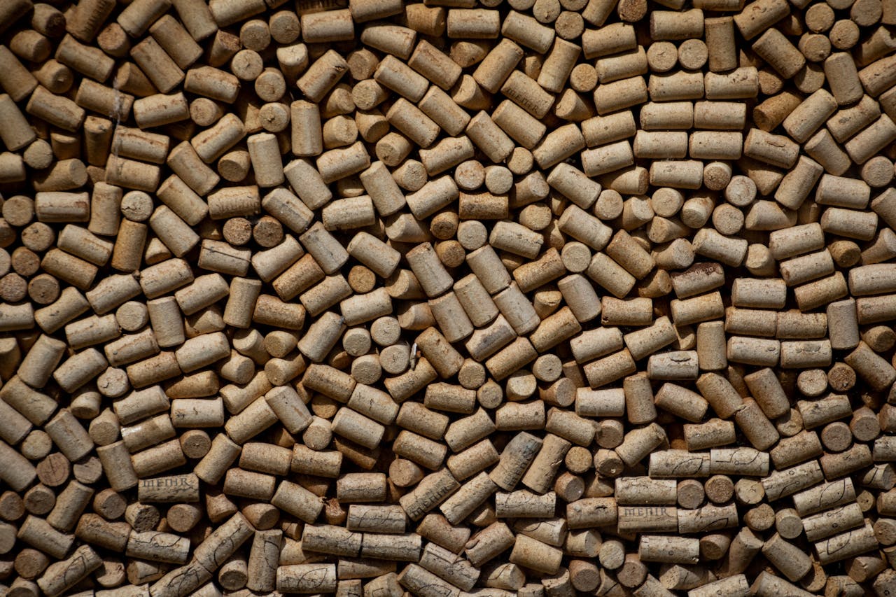 <p> Natural wine corks are biodegradable, but many people are unaware they can also be recycled. Programs like ReCORK collect natural corks and repurpose them into products such as flooring, insulation, and shoe soles. If you enjoy wine, start saving your corks and drop them off at participating locations or mail them to organizations that specialize in cork recycling. This small step can make a significant impact by reducing waste and giving corks a new purpose. </p> :: Pexels