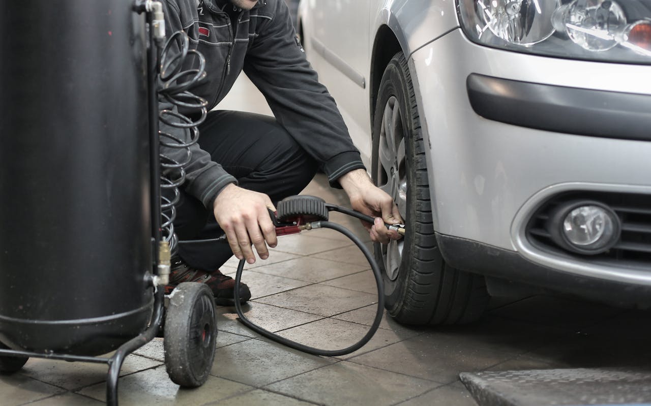 <p> A portable air compressor is a game-changer when it comes to maintaining your car’s tires. If you find yourself with low tire pressure, having a portable air compressor on hand allows you to inflate your tires quickly and easily. Many models are compact, lightweight, and can be powered through your car’s 12V outlet. With a portable air compressor, you won’t have to rely on gas station air pumps, which can sometimes be out of service or inconveniently located. These compressors often come with built-in pressure gauges, so you can easily monitor your tire pressure while inflating. Having one in your car means you can maintain proper tire pressure and avoid the risks associated with driving on under-inflated tires. </p> :: Pexels