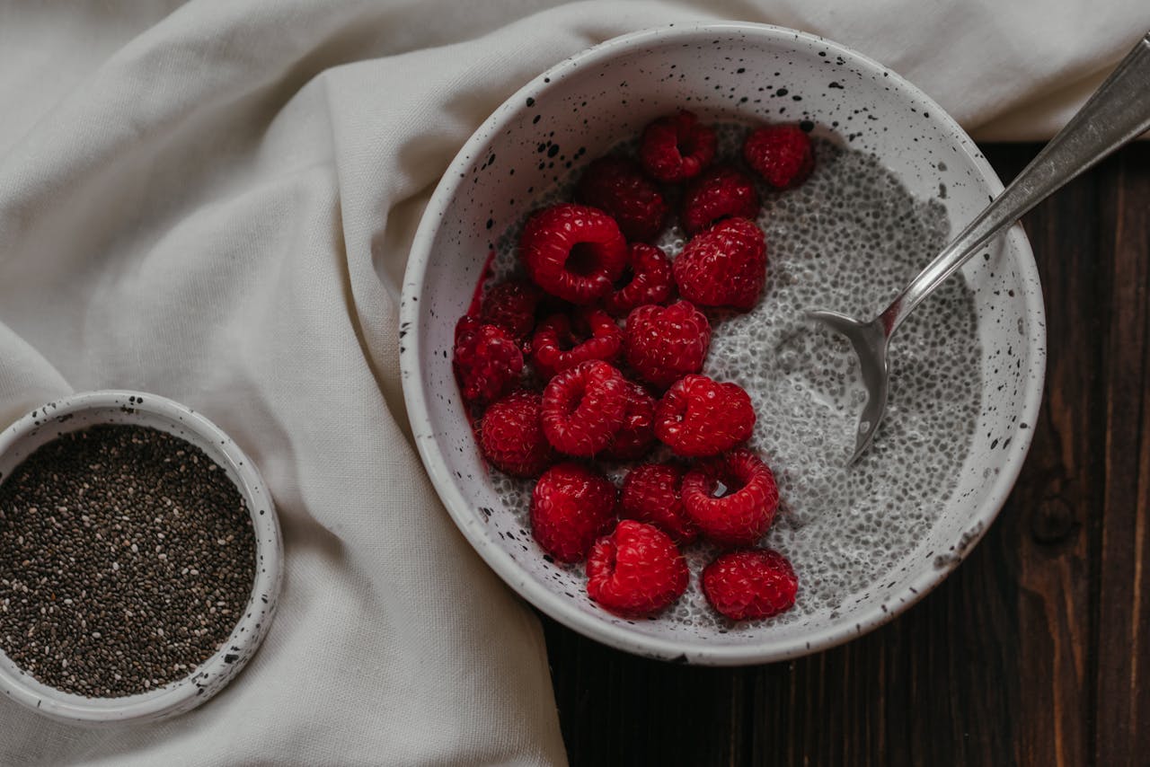 <p> If you’re looking for a healthy dessert or snack, berry chia pudding is an excellent choice. Chia seeds are rich in omega-3 fatty acids, fiber, and antioxidants, making them a nutritional superstar. To make the pudding, combine chia seeds with almond milk, a touch of honey, and vanilla extract, then let it sit in the fridge overnight to thicken. Top with fresh berries like strawberries, blueberries, and raspberries for a naturally sweet and antioxidant-rich finish. This dish is perfect for satisfying your sweet tooth while supporting digestive health. You can also experiment with toppings like shredded coconut or granola. </p> :: Pexels