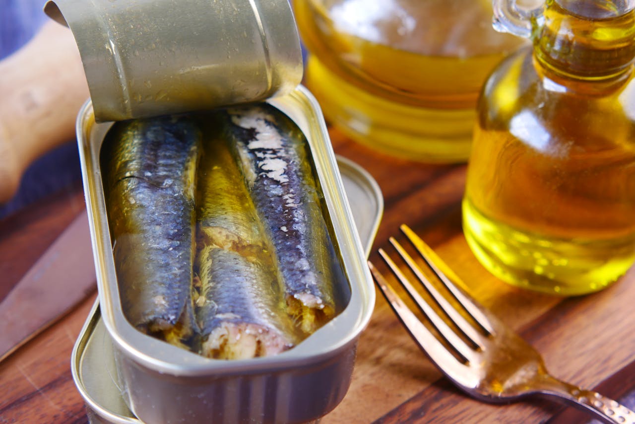 <p> Canned fish like tuna, salmon, and sardines are rich in omega-3 fatty acids, protein, and essential vitamins like D and B12. They are shelf-stable, affordable, and versatile, making them an excellent pantry staple. Opt for varieties packed in water or olive oil and enjoy them in salads, sandwiches, or pasta dishes. Canned fish is also a convenient way to increase your intake of omega-3s, which support brain health and reduce inflammation. For a quick snack, pair canned fish with whole-grain crackers or mix it with avocado for a nutritious spread. </p> :: Pexels