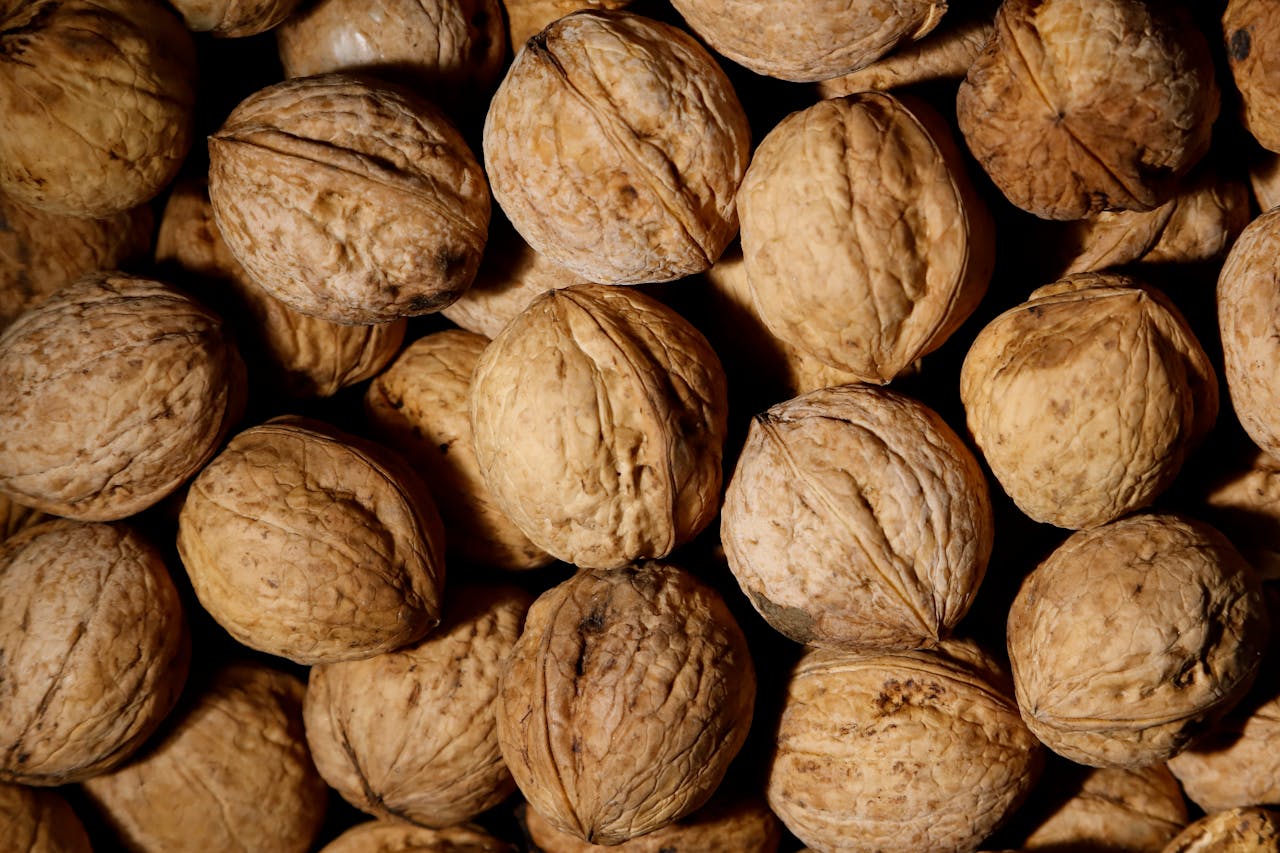 <p> Walnuts are a nutrient-dense snack that offers numerous health benefits, particularly for brain and heart health. They are one of the best plant-based sources of omega-3 fatty acids, which help reduce inflammation and support cognitive function. Walnuts are also rich in antioxidants, magnesium, and vitamin E, which contribute to better heart health and reduced cholesterol levels. Adding a handful of walnuts to your daily diet, whether as a topping for yogurt or a quick snack, can make a big difference in your overall health. </p> :: Pexels