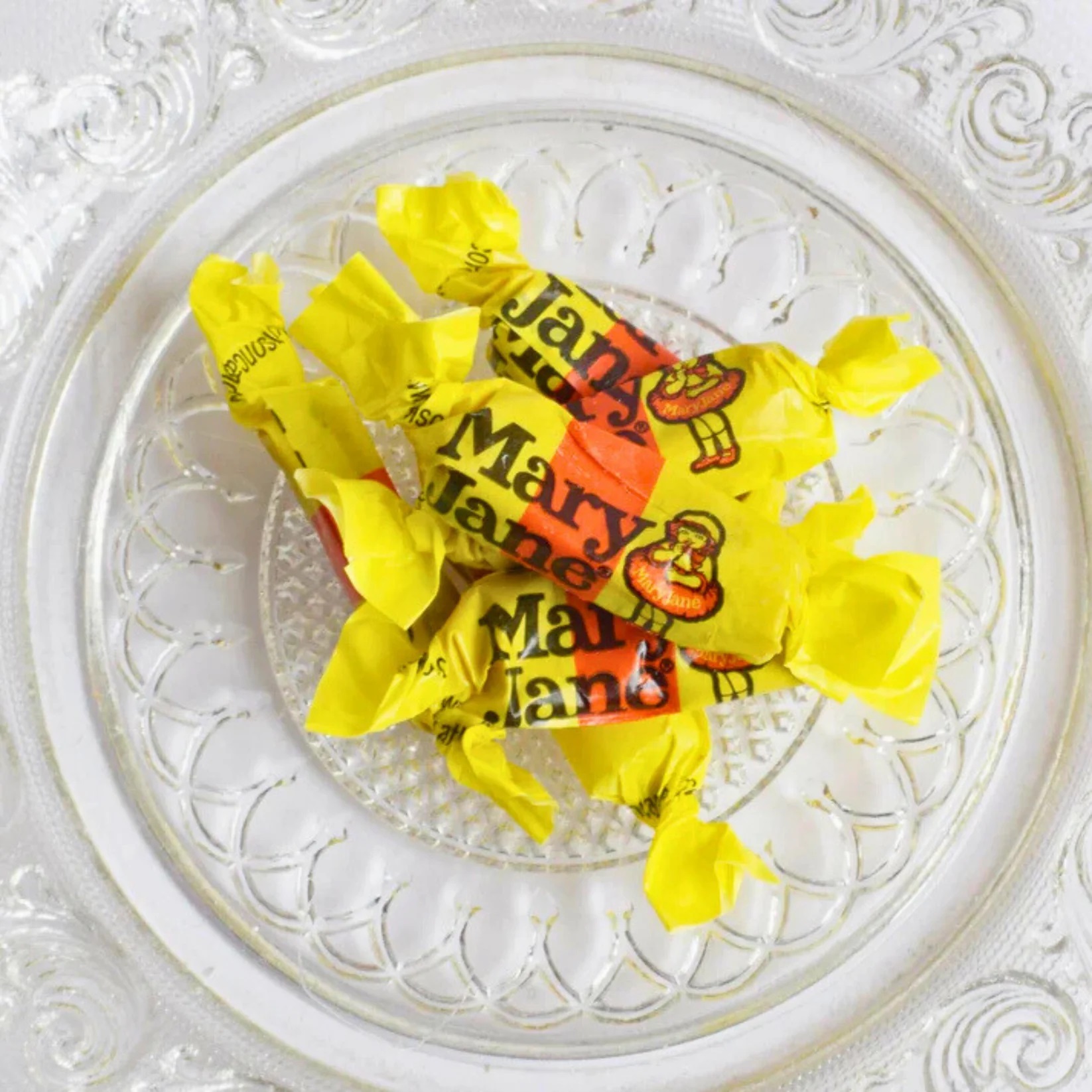 <p>These peanut butter and molasses candies, wrapped in iconic yellow and red wax paper, have been around since 1914. Their chewy texture and distinctive flavor make them a timeless favorite.</p> ::truetreatscandy