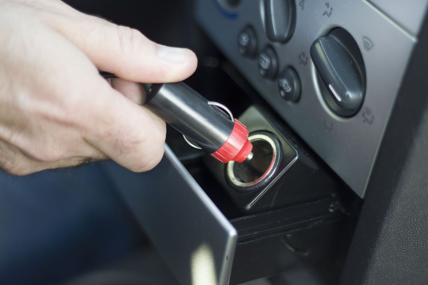 <p>Automakers continuously improved cigarette lighters, making them more reliable and user-friendly. The push-button design and integrated power source made them an indispensable accessory. In the 1990s, Chrysler led the charge by removing cigarette lighters from their new models, but the power outlet remained.</p> ::Pexels