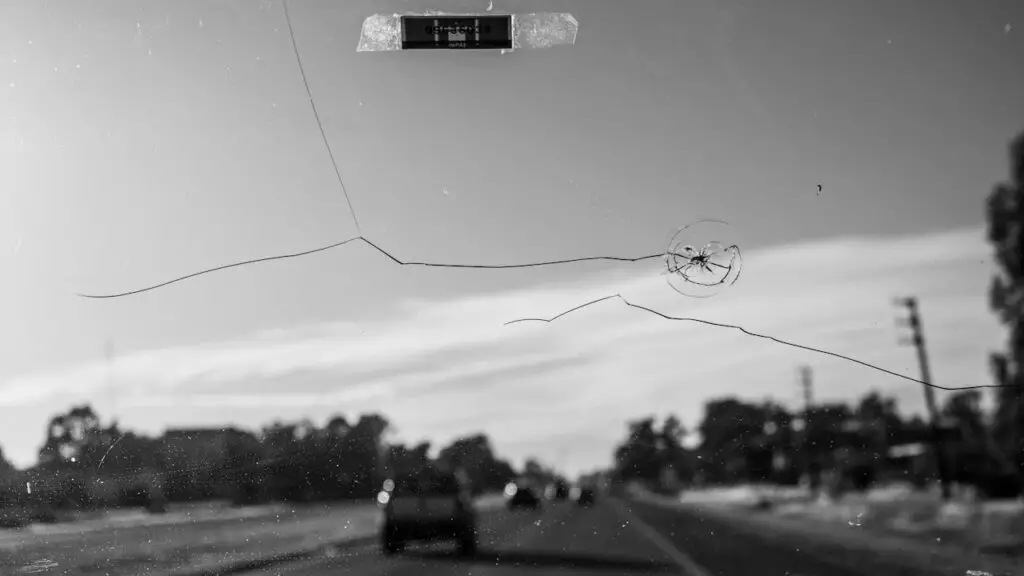 <p> In this scam, someone might throw an object at your windshield, causing a small crack or chip. Then, they will flag you down and claim that you caused the damage. They may offer to repair it for a fee or insist that you pay for the damage. If your windshield is damaged, it’s better to call your insurance company or a trusted repair service rather than dealing with someone on the side of the road. Don’t agree to any repairs without verifying the legitimacy of the person offering them. </p> :: Pexels