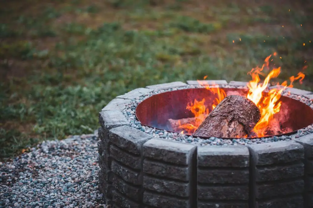 <p> Fire pits are a popular backyard feature, especially during cooler months. However, many cities and towns have specific regulations regarding the use of fire pits. In some areas, fire pits are required to be a certain distance away from structures, fences, or trees to minimize fire hazards. Additionally, some municipalities require fire pits to have safety features, such as a metal mesh screen or a stone ring, to contain the flames. If your fire pit doesn’t meet these safety standards, you could be fined or asked to remove it. </p> :: Pexels