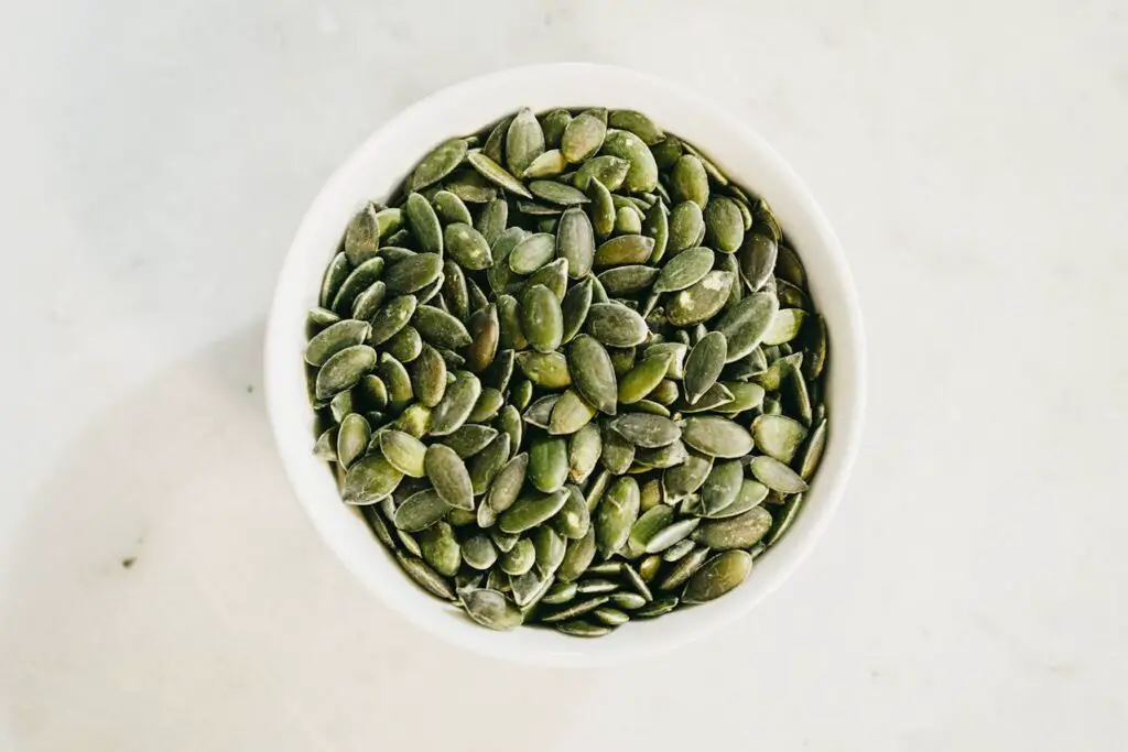 <p> Pumpkin seeds, also known as pepitas, are loaded with magnesium, zinc, iron, and healthy fats, making them an excellent snack for boosting energy and immunity. Their high antioxidant content helps reduce inflammation and protect cells from damage. These seeds also promote prostate health in men and support better sleep due to their natural tryptophan content. Enjoy them roasted with a sprinkle of sea salt, add them to granola, or blend them into a creamy pumpkin seed butter for a nutritious treat. They also make a great topping for soups and salads, adding a delightful crunch and nutritional boost. </p> :: Pexels