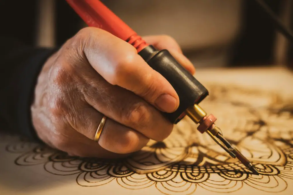 <p>Woodburning, or pyrography, is the art of drawing on wood using a heated pen. You don’t need much to start—just soft wood and a basic tool kit. Trace a design, warm up your pen, and burn your pattern in slow lines. You can write quotes, draw animals, or mark a sign for your garden. It’s quiet work, and the results look sharp and natural. It’s also a good way to add custom flair to gifts or home items.</p> ::Unsplash
